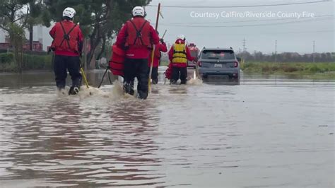 Water rescues spike as storm flood Southern California roads, rivers
